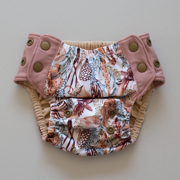 Kekoa flexible stretch wing swim nappy in Cove print. From 4-19kg (9lbs - 42lbs) in a one size OSFM design. 